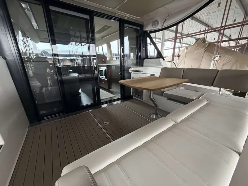 Slide: The Image of Interior of 2017 Regal 42 Grande Coupe with elegant seating area. - 22