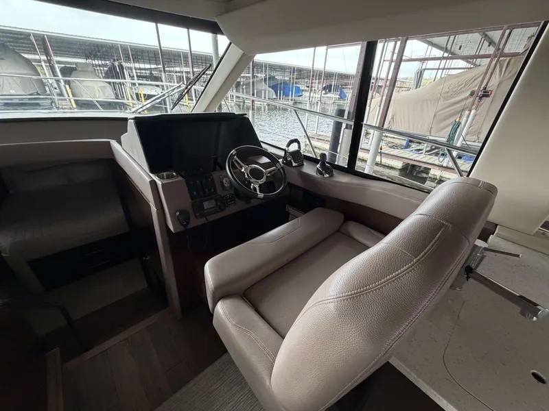 Slide: The Image of Interior of 2017 Regal 42 Grande Coupe with helm station. - 27