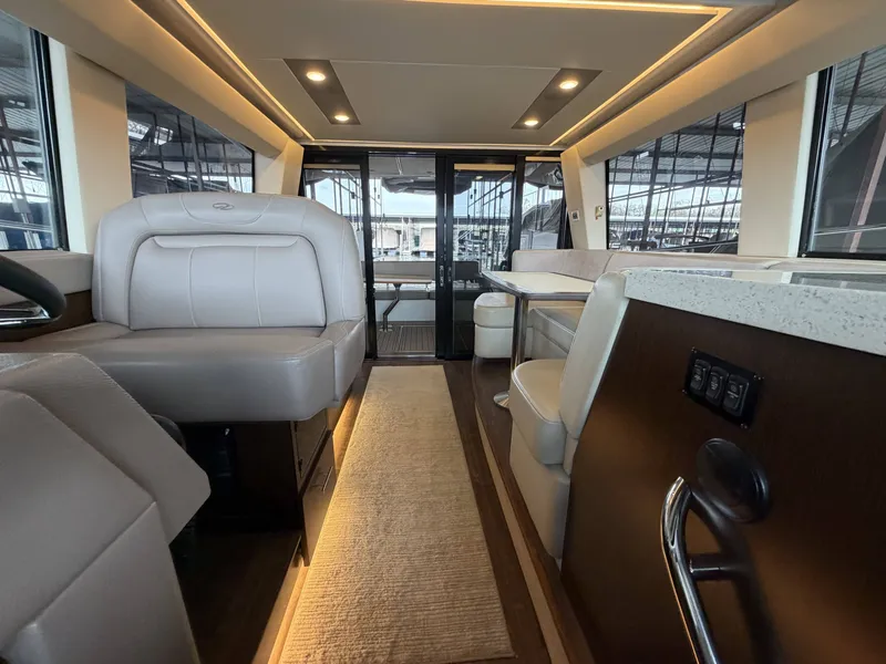 Slide: The Image of Interior of 2017 Regal 42 Grande Coupe with luxurious design. - 28