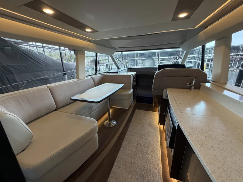 Slide: The Image of Interior of 2017 Regal 42 Grande Coupe with modern amenities. - 30