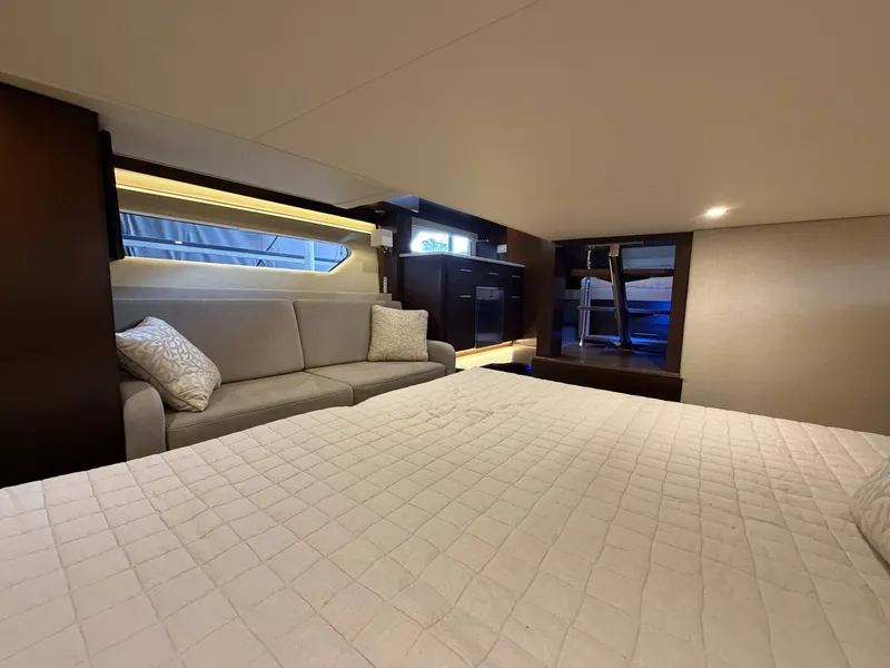 Slide: The Image of Interior of 2017 Regal 42 Grande Coupe with sofa and bed. - 33