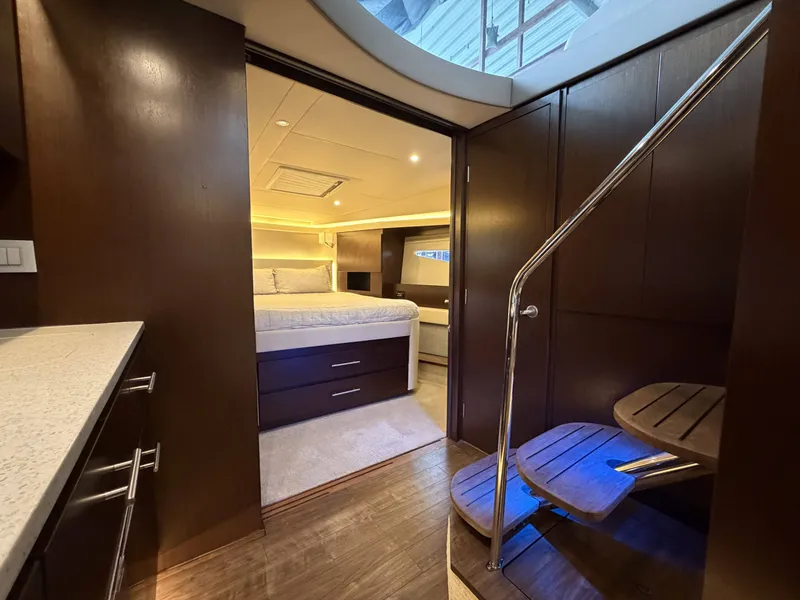 Slide: The Image of Interior of 2017 Regal 42 Grande Coupe with stairs and bedroom. - 34
