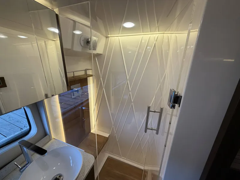 Slide: The Image of Luxurious bathroom in the 2017 Regal 42 Grande Coupe. - 39