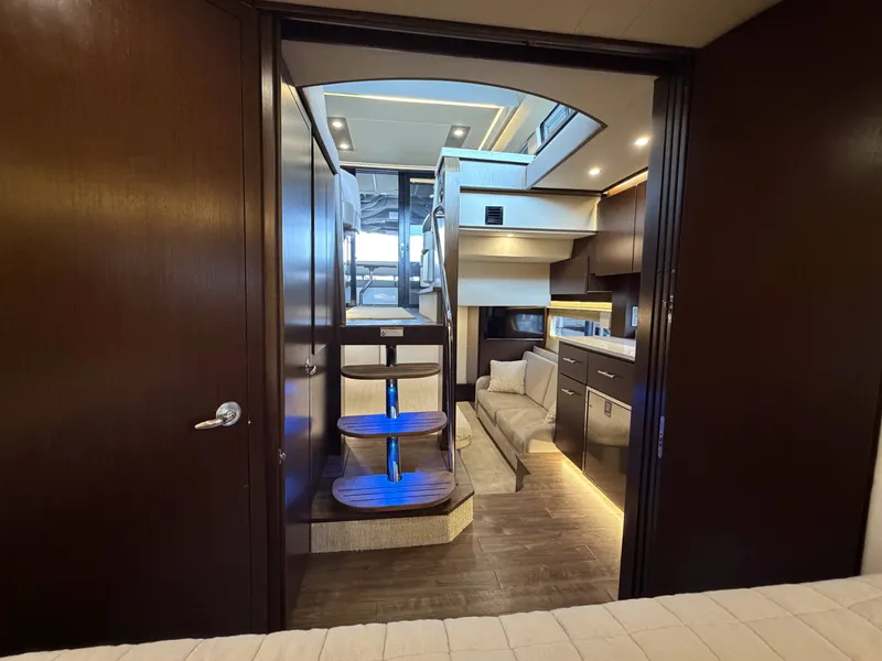 Slide: The Image of Interior of 2017 Regal 42 Grande Coupe with modern furnishings. - 41
