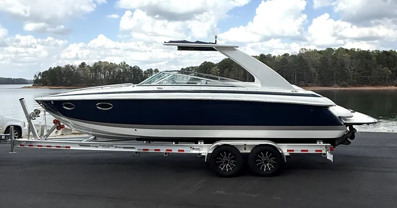 The Image of 2006 Cobalt 263 boat on trailer by lakeside. - 1
