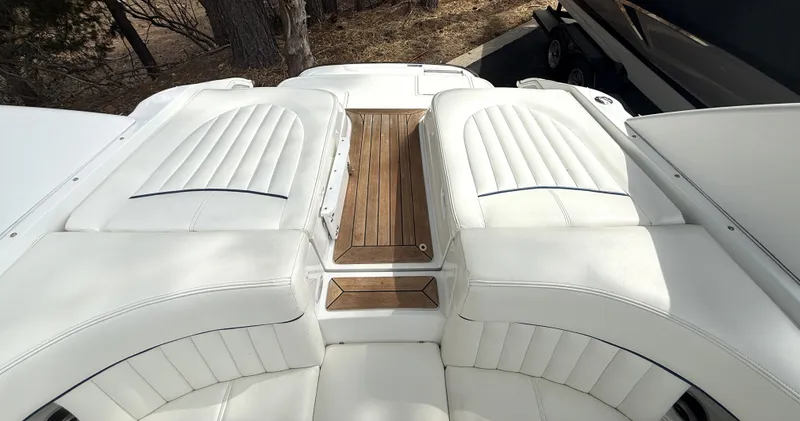 Slide: The Image of Rear view of a 2006 Cobalt 263 boat with white seating. - 15