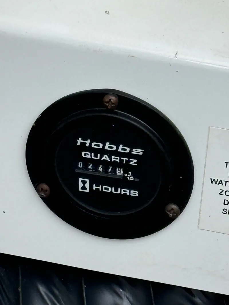 Slide: The Image of Hobbs Quartz hour meter on 2006 Cobalt 263 boat. - 22