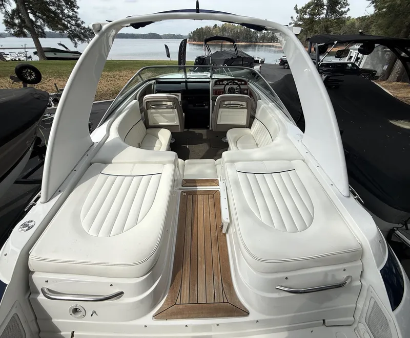Slide: The Image of Interior view of a 2006 Cobalt 263 boat with white seating. - 6