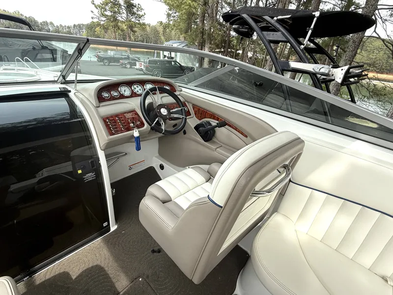 Slide: The Image of Interior of a 2006 Cobalt 263 boat with steering console. - 9