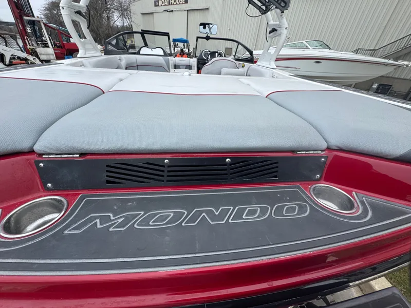 Slide: The Image of 2017 Moomba Mondo boat with gray upholstery and red accents. - 10