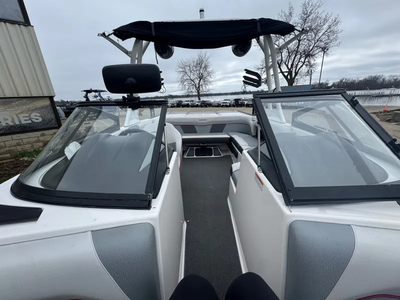 Slide: The Image of Interior view of a 2017 Moomba Mondo boat at the dock. - 17