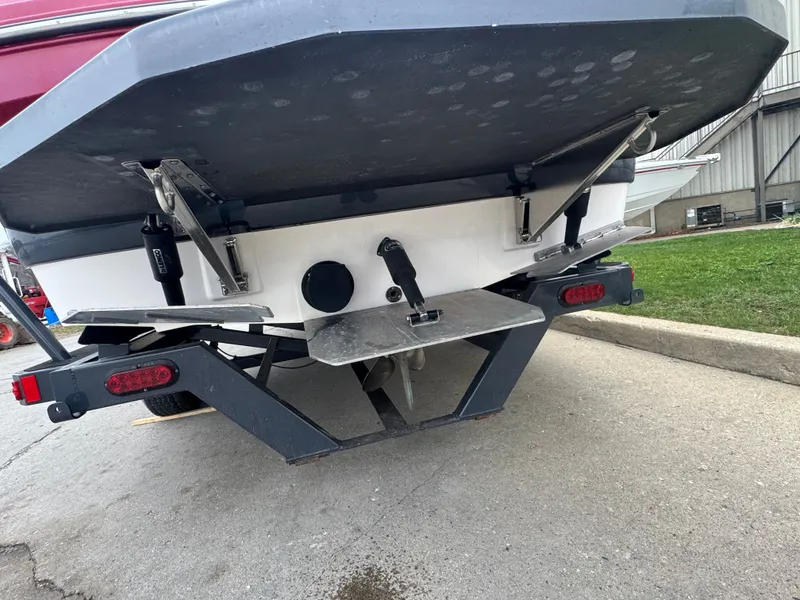 Slide: The Image of Rear view of a 2017 Moomba Mondo boat on a trailer. - 4