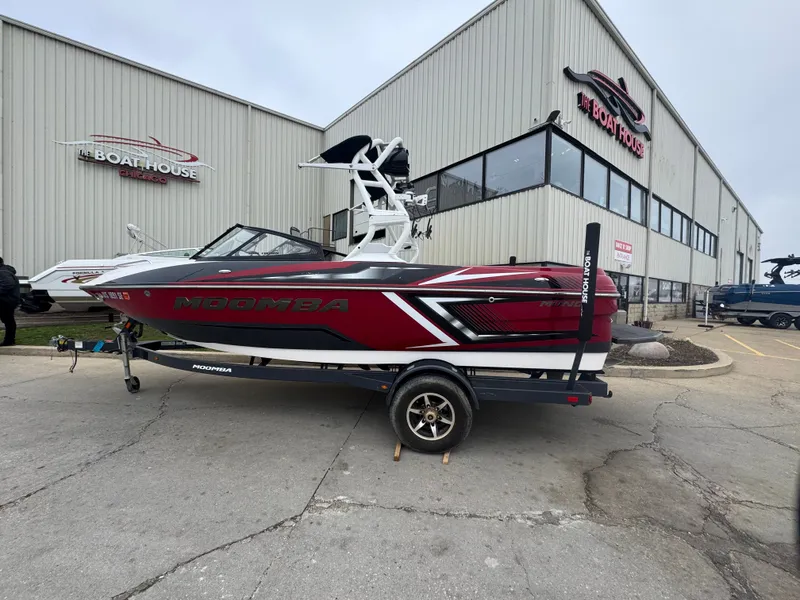 Slide: The Image of 2017 Moomba Mondo boat in front of a Chicago boathouse. - 5