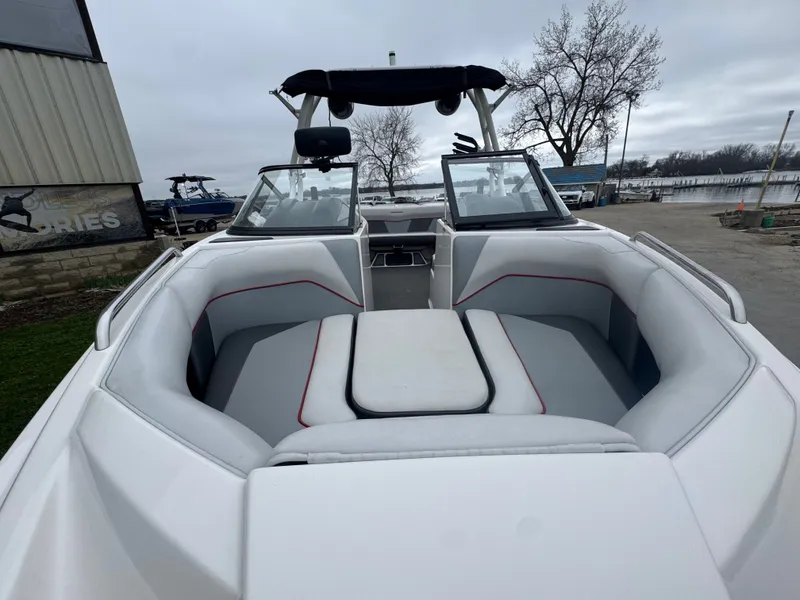 Slide: The Image of 2017 Moomba Mondo boat with spacious interior and gray upholstery. - 9