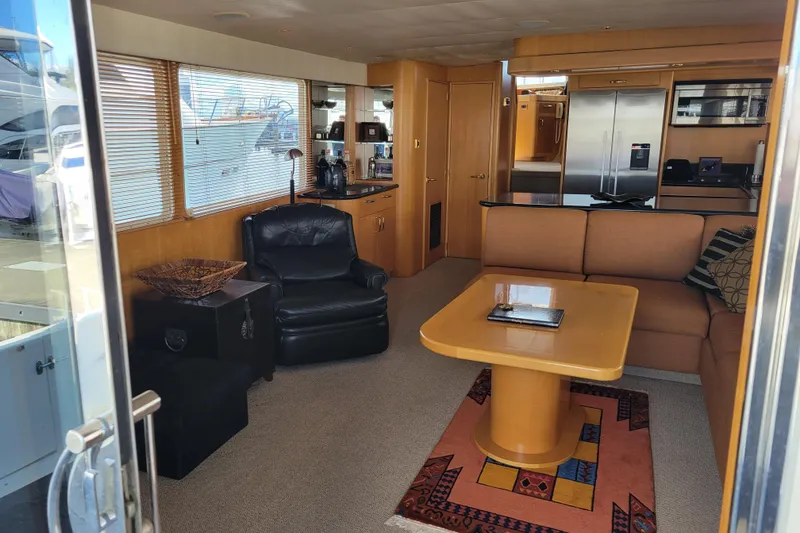 Slide: The Image of Luxurious interior of a 1998 Tollycraft 65 Pilothouse yacht with modern furnishings. - 37