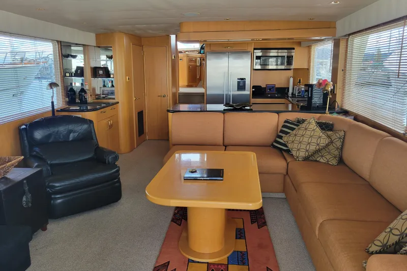 Slide: The Image of Luxurious interior of a 1998 Tollycraft 65 Pilothouse yacht with modern furnishings. - 40
