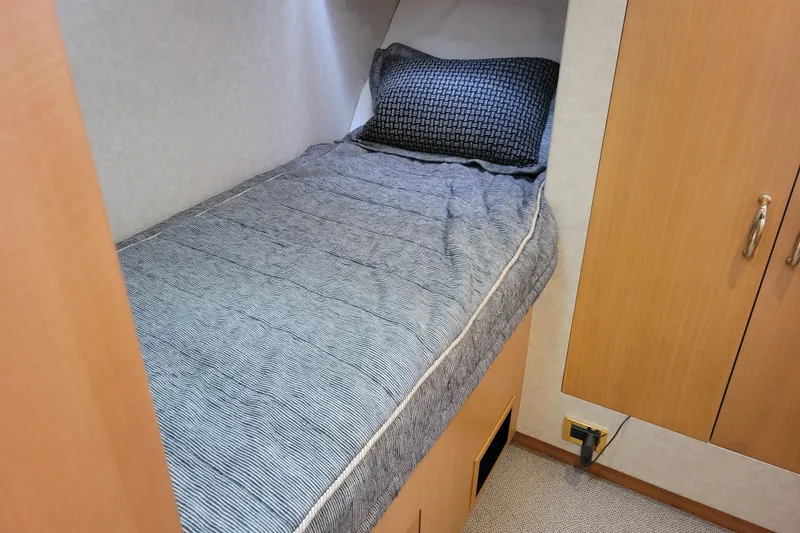 Slide: The Image of Cozy cabin bed in 1998 Tollycraft 65 Pilothouse yacht interior. - 57