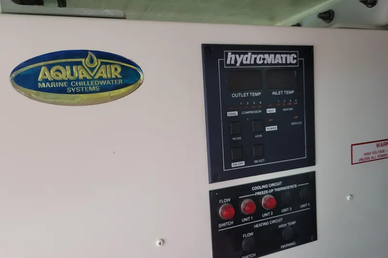 Slide: The Image of Control panel of Aquair marine chilled water system on 1998 Tollycraft 65 pilothouse yacht. - 63