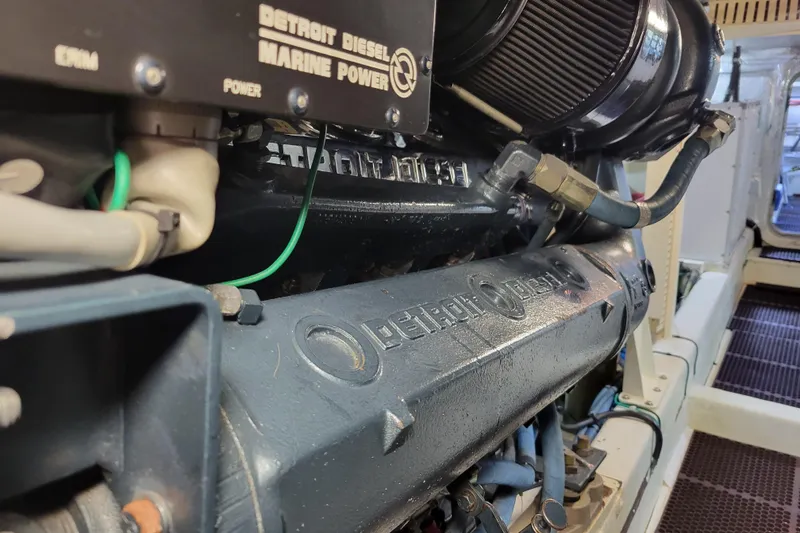 Slide: The Image of Engine room of a 1998 Tollycraft 65 Pilothouse with Detroit Diesel Marine Power. - 65