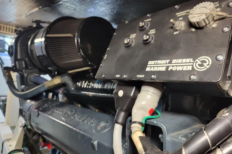Slide: The Image of Engine room of 1998 Tollycraft 65 Pilothouse with Detroit Diesel Marine Power. - 66