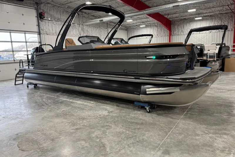 The Image of 2026 Sylvan G5 pontoon boat in a showroom, showcasing sleek design and modern features. - 1