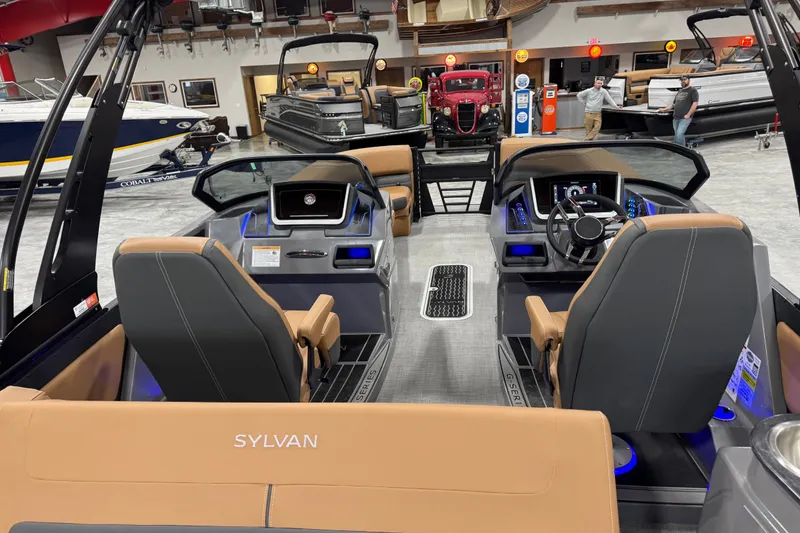 Slide: The Image of Interior view of 2026 Sylvan G5 boat with modern dashboard and seating. - 20