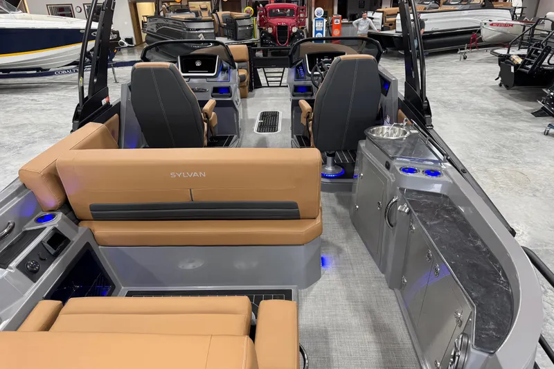 Slide: The Image of Interior of 2026 Sylvan G5 boat with modern seating and control panel. - 22