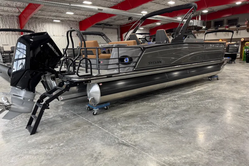 Slide: The Image of 2026 Sylvan G5 pontoon boat with Mercury outboard motor in showroom. - 3