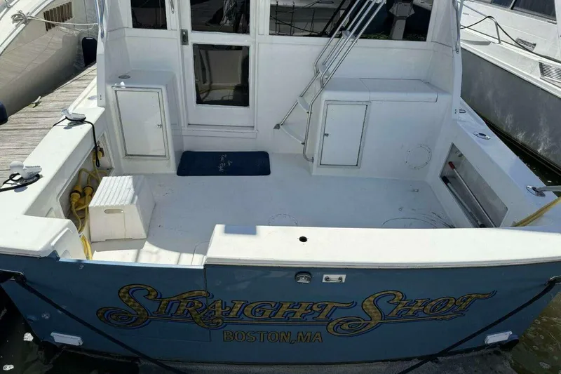 Slide: The Image of 1988 Ocean Yachts 35 Super Sport boat named "Straight Shot" docked in Boston, MA. - 3