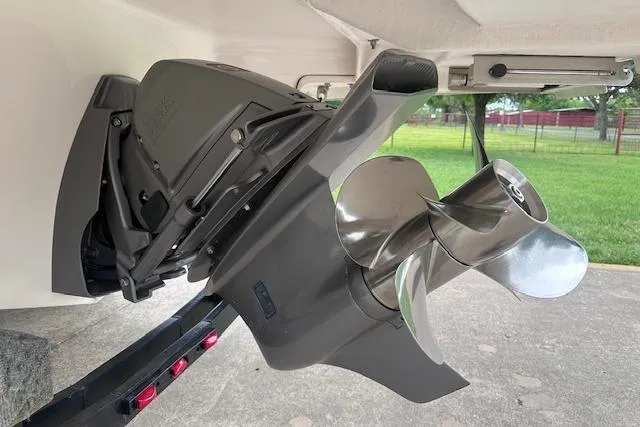 Slide: The Image of Propeller of a 2014 Regal 27 FasDeck boat, displayed on a trailer. - 10