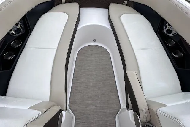 Slide: The Image of Interior of a 2014 Regal 27 FasDeck boat, featuring spacious seating and modern design. - 23