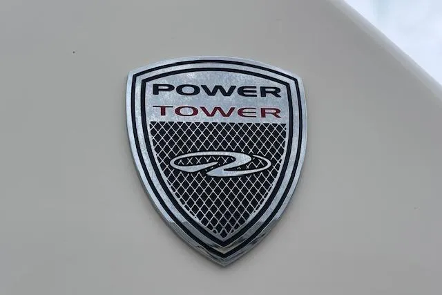 Slide: The Image of 2014 Regal 27 FasDeck Power Tower emblem on boat exterior. - 29