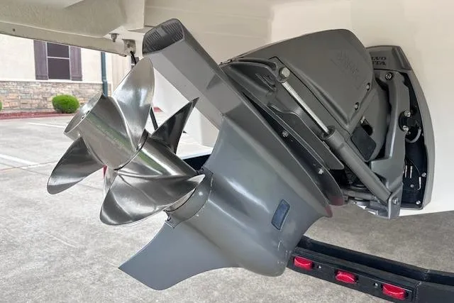 Slide: The Image of 2014 Regal 27 FasDeck boat propeller and outdrive close-up. - 7