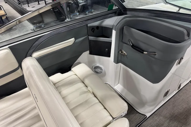 Slide: The Image of Interior of a 2016 Cobalt R7 boat, featuring sleek seating and modern design elements. - 11