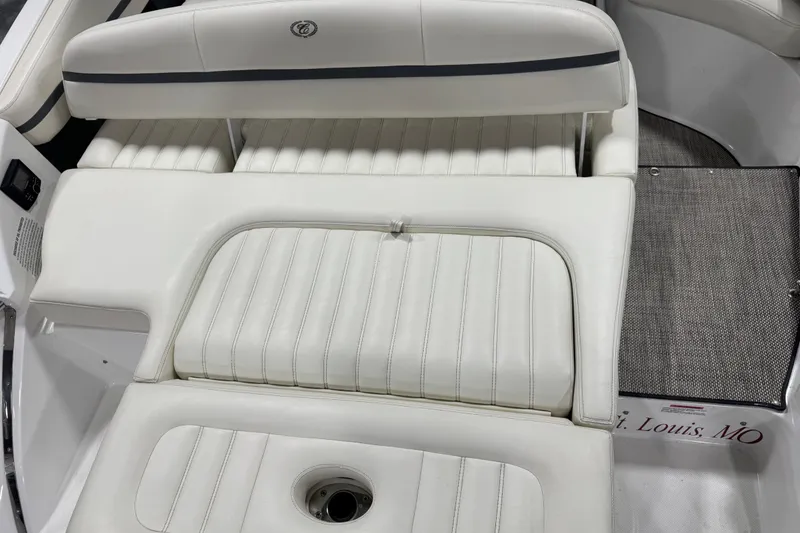 Slide: The Image of Interior seating of a 2016 Cobalt R7 boat, featuring white upholstery and sleek design. - 7
