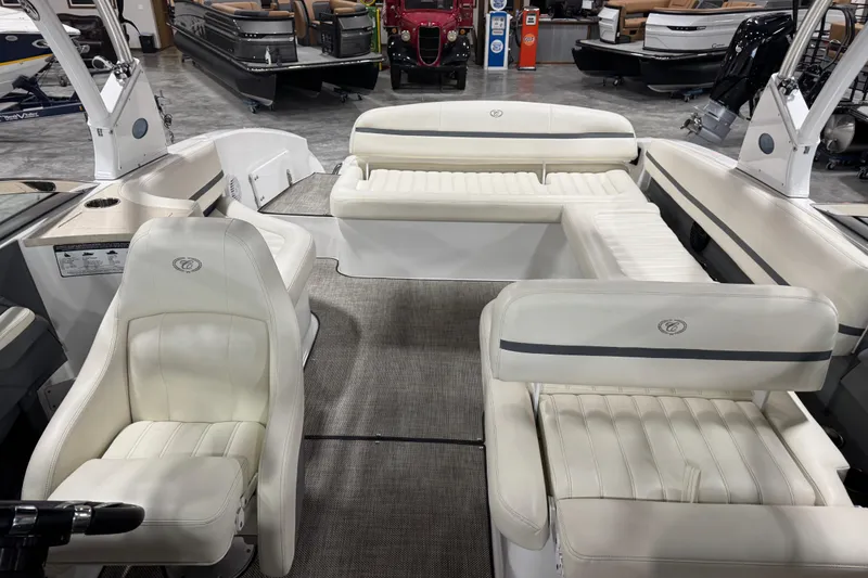 Slide: The Image of 2016 Cobalt R7 boat interior with white leather seating and modern design. - 9