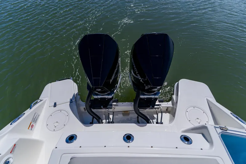 Slide: The Image of Boston Whaler 280 Vantage 2021 boat with dual outboard engines on water. - 20