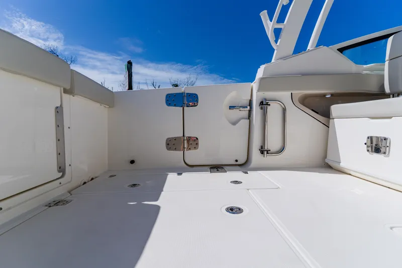 Slide: The Image of 2021 Boston Whaler 280 Vantage boat interior with open deck and seating. - 30