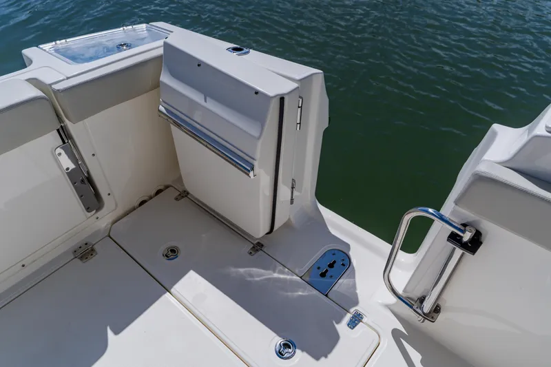 Slide: The Image of 2021 Boston Whaler 280 Vantage boat deck with seating and water access. - 31