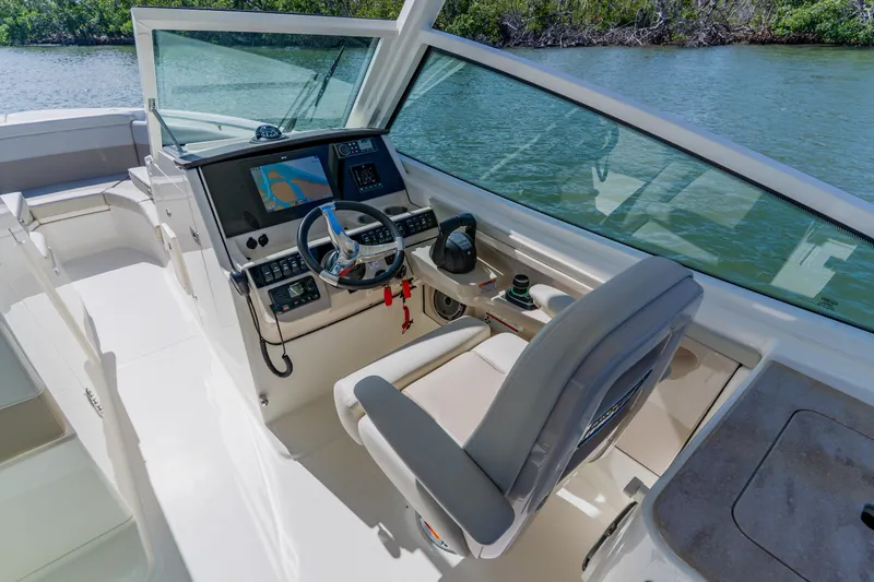 Slide: The Image of 2021 Boston Whaler 280 Vantage helm with modern controls and navigation system. - 45