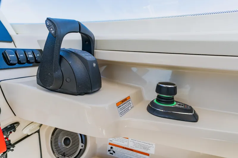 Slide: The Image of Control panel of 2021 Boston Whaler 280 Vantage boat with throttle and joystick. - 52