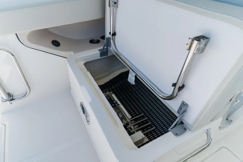 Slide: The Image of Open storage compartment on a 2021 Boston Whaler 280 Vantage boat. - 60