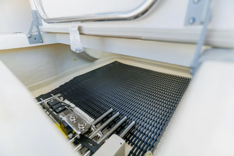 Slide: The Image of Storage compartment of 2021 Boston Whaler 280 Vantage boat, featuring organized interior space. - 61