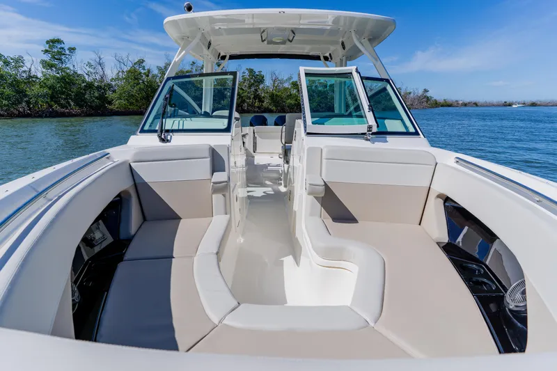 Slide: The Image of 2021 Boston Whaler 280 Vantage boat interior with spacious seating and open water view. - 72