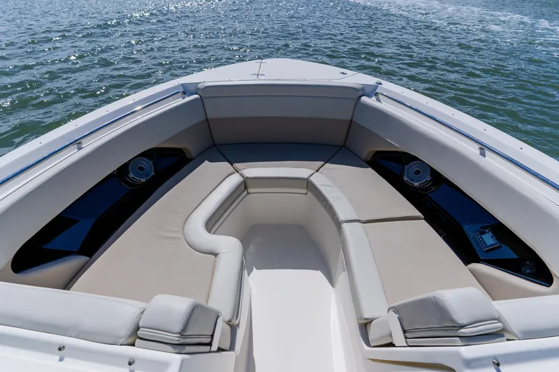 Slide: The Image of Luxurious seating area on 2021 Boston Whaler 280 Vantage boat, overlooking serene water. - 73