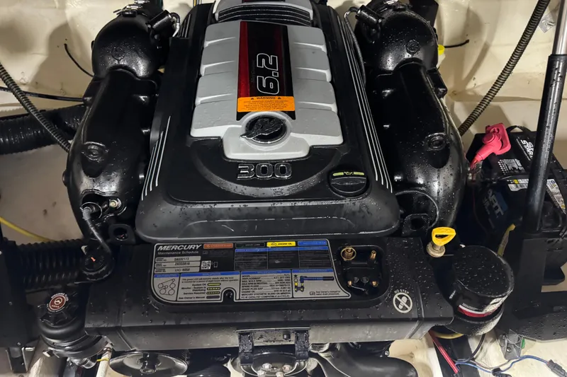 Slide: The Image of Engine of a 2017 Chaparral 257 SSX boat, featuring a Mercury 6.2L motor. - 19