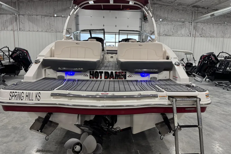 Slide: The Image of 2017 Chaparral 257 SSX boat in a garage, featuring "Spring Hill KS" text. - 5