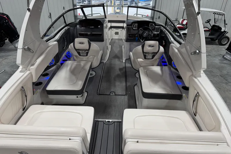 Slide: The Image of 2017 Chaparral 257 SSX boat interior with luxurious seating and modern dashboard. - 6
