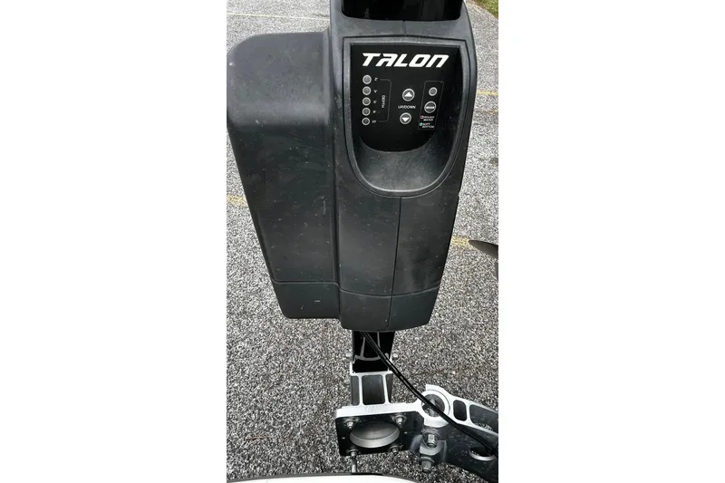 Slide: The Image of Talon anchor system on 2015 NauticStar 231 Coastal boat, shown on pavement. - 34