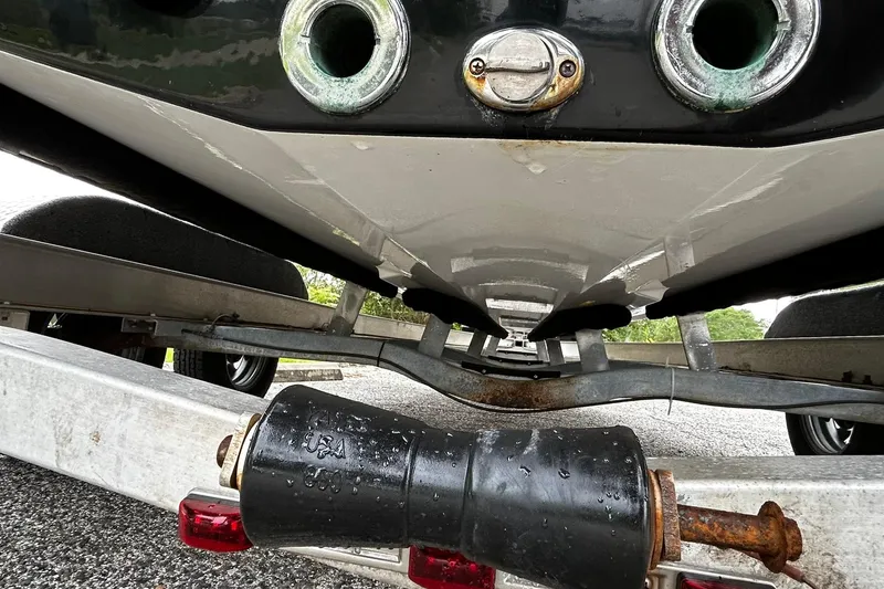 Slide: The Image of Underside view of 2015 NauticStar 231 Coastal boat on trailer, showing hull and fittings. - 6